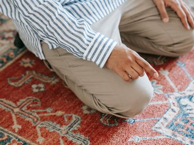 Macro shot of a person hands in prayer position.
